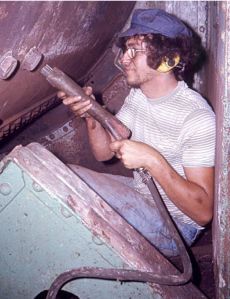 Mori needle gunning Waratah's boiler about 1976